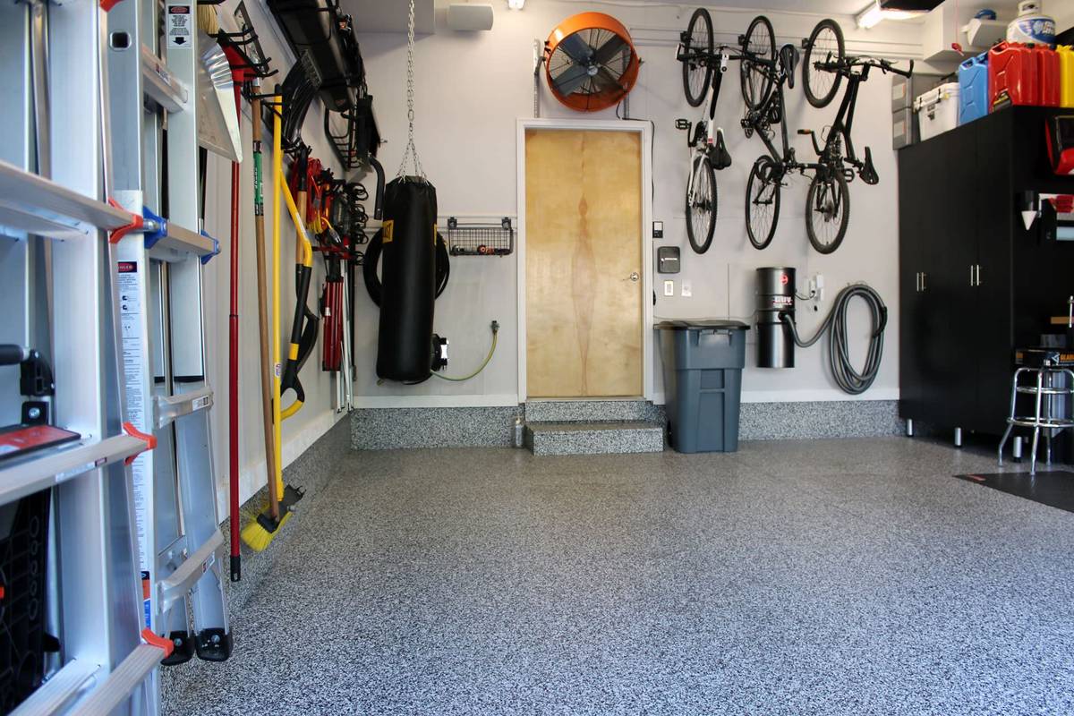 Flake epoxy garage floor with storage in the Greater Boston area