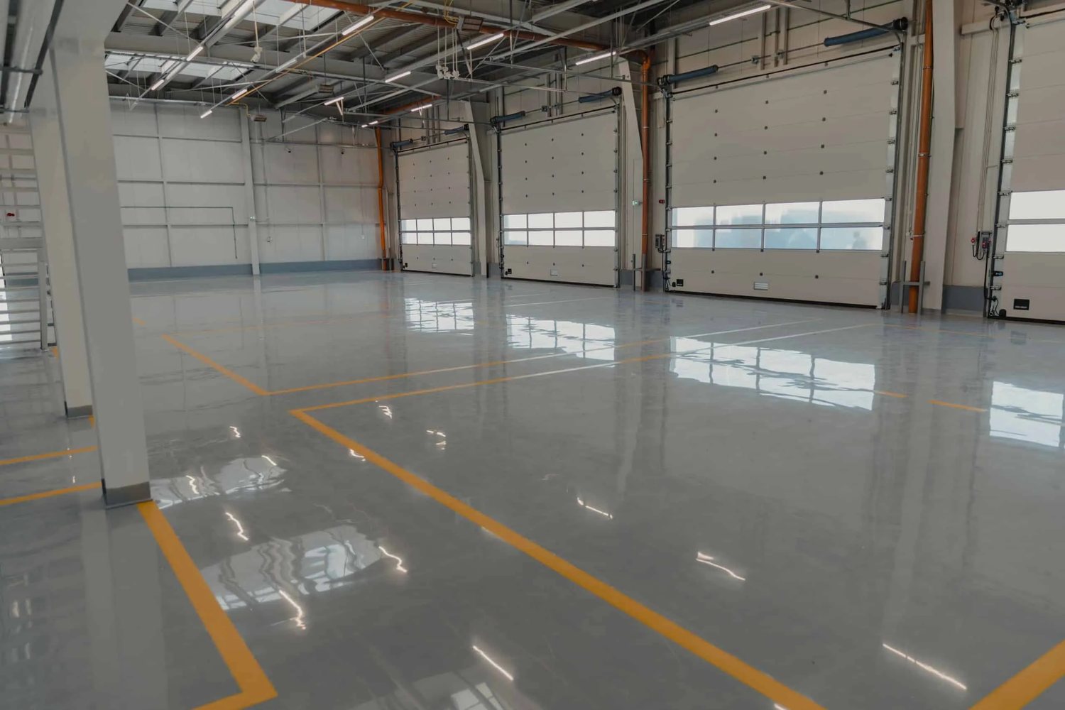 Warehouse floor coating with yellow safety lane striping
